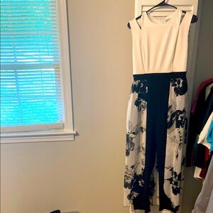 Floral jumpsuit with open half skirt